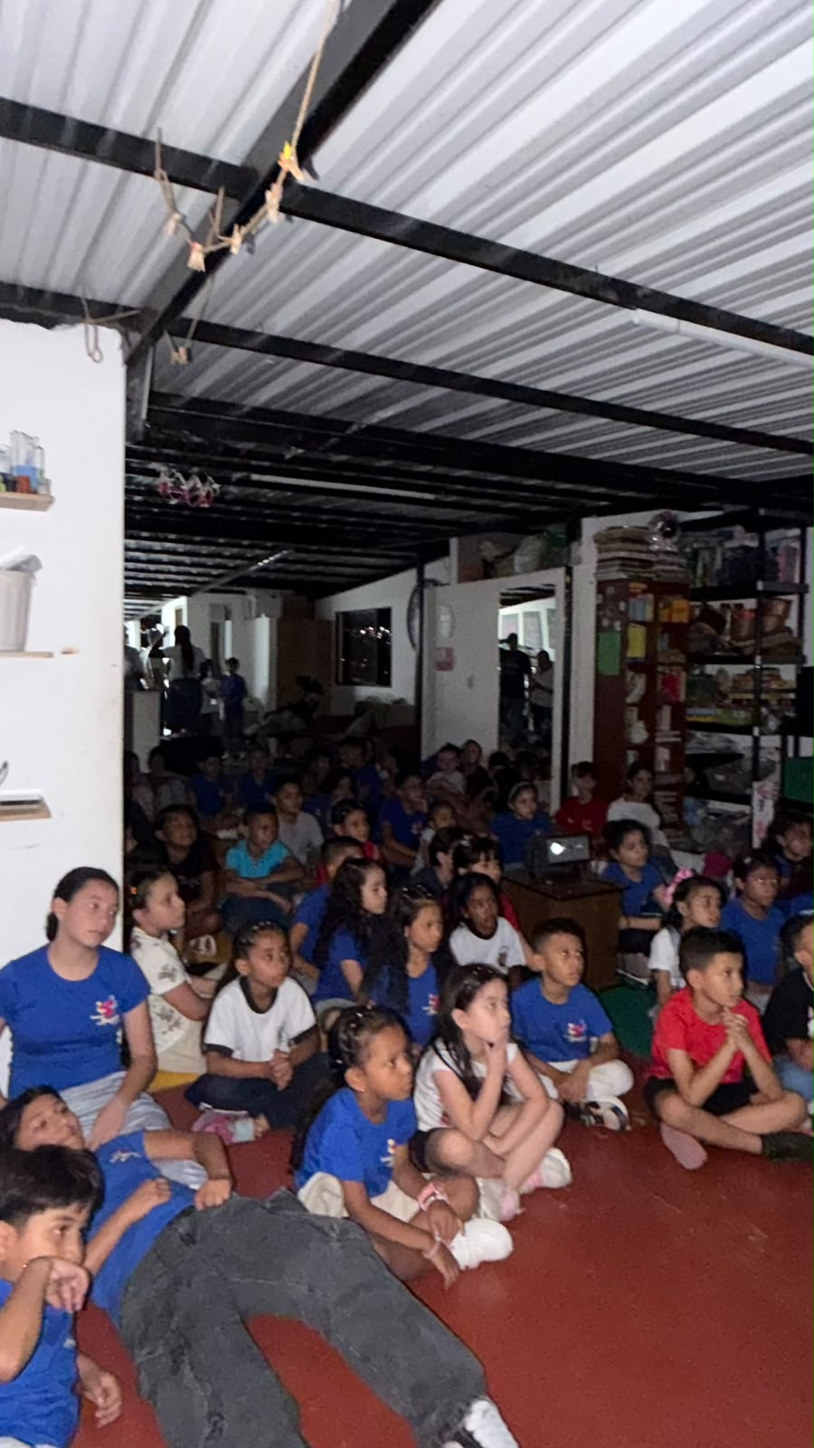 Children sitting together watching