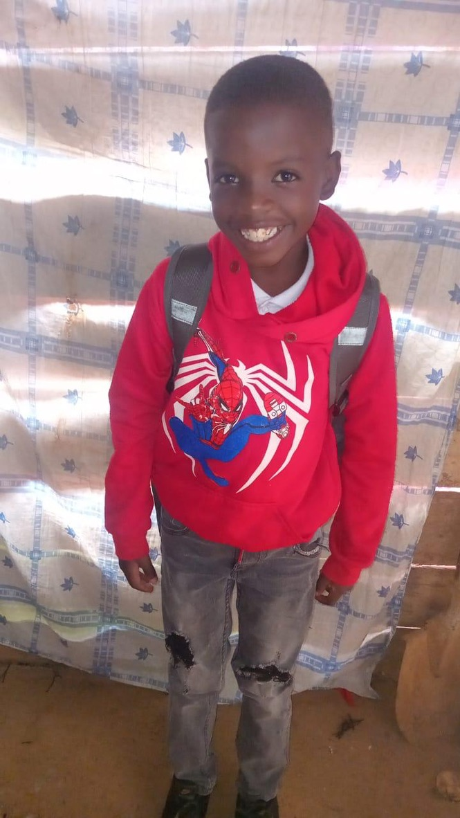 A boy in his new sweatshirt.