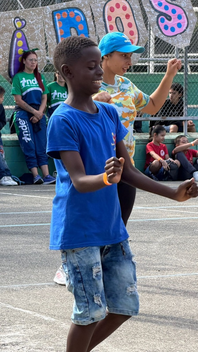 Dancing at an outdoor celebration in Medellín.