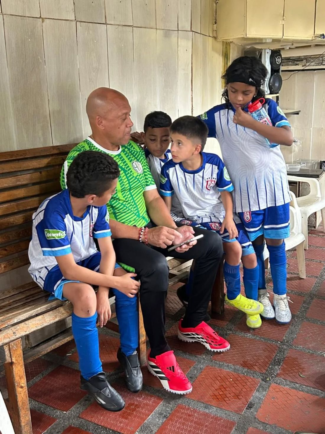 Coach Chonto with young players in Medellín