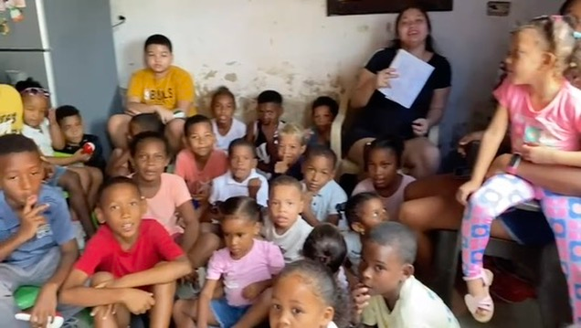 Children gathered for a lesson.