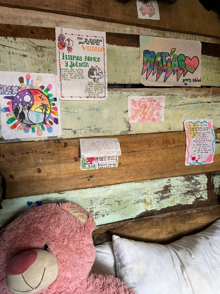 Drawings on a child’s bedroom wall.