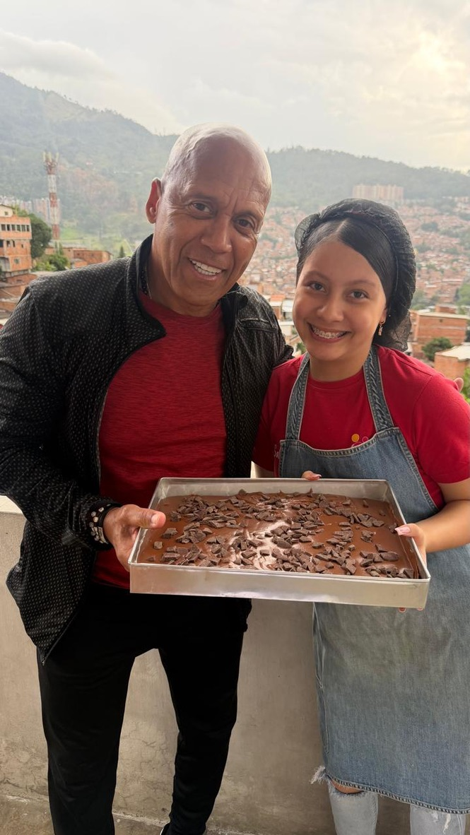 Coach Chonto and a young baker with their tray of brownies, October 2026.