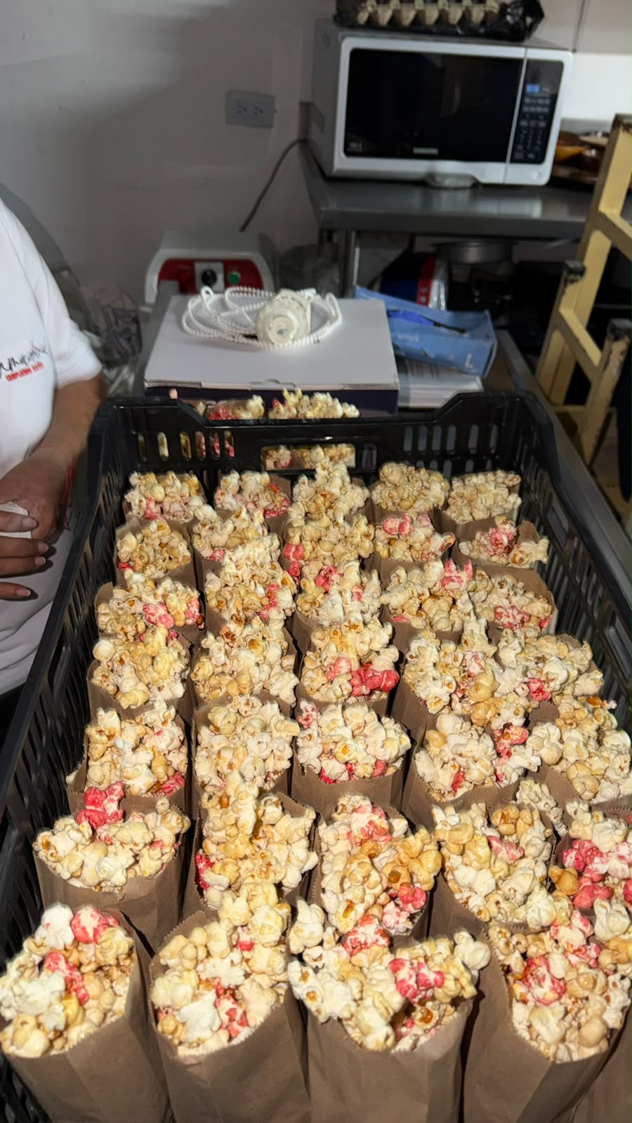 Crate of bagged popcorn