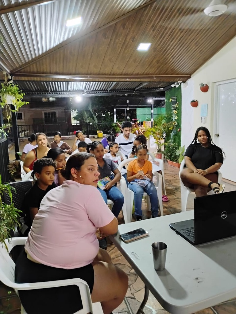 A virtual English class on a patio in the Dominican Republic.