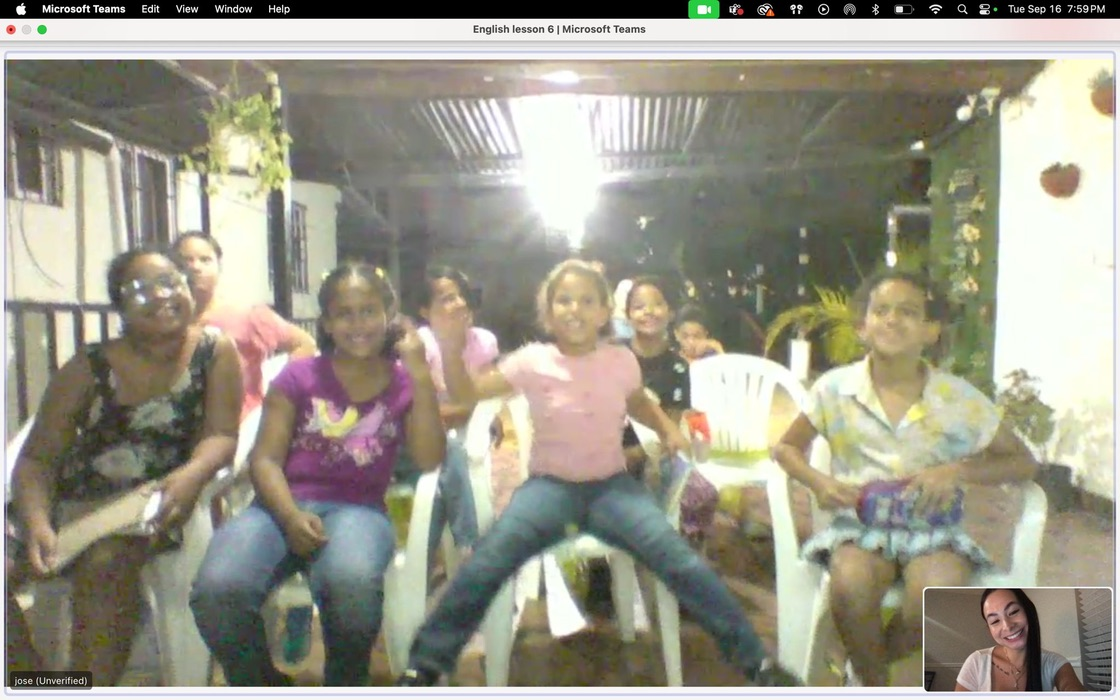 Families seated together at a gathering.