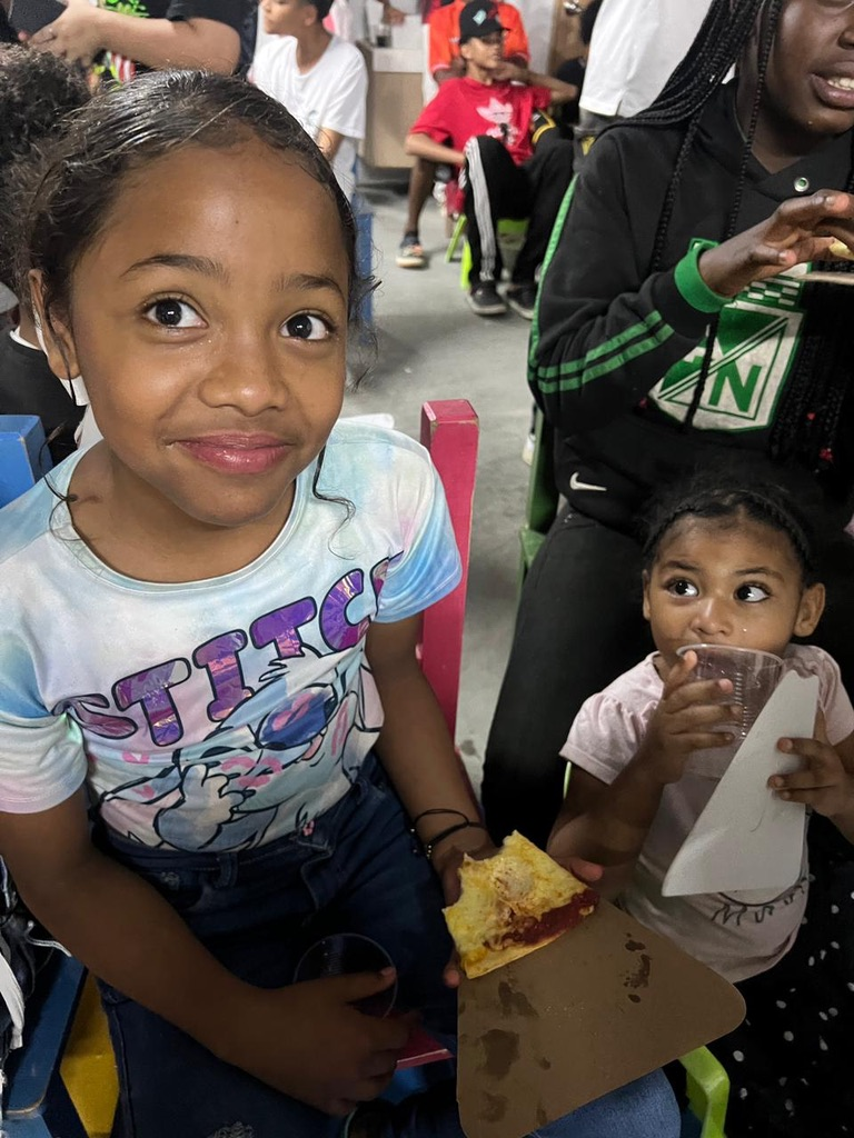 All smiles at pizza night.