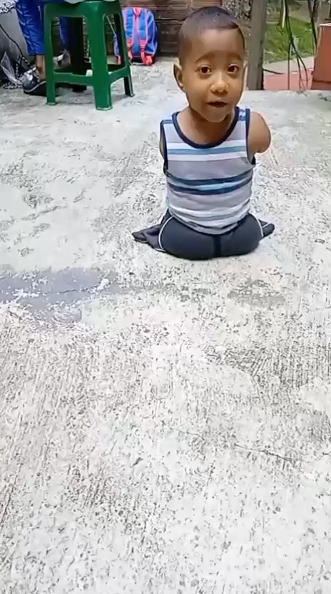 A little one outdoors.