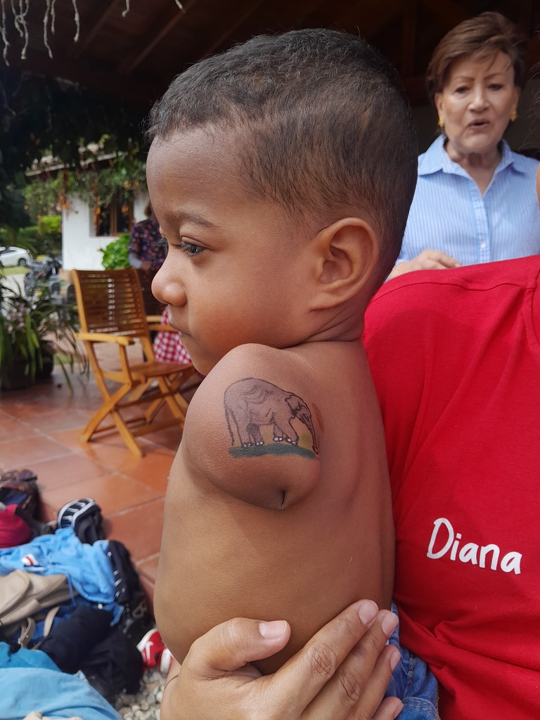 Art on a little shoulder at a community outing.