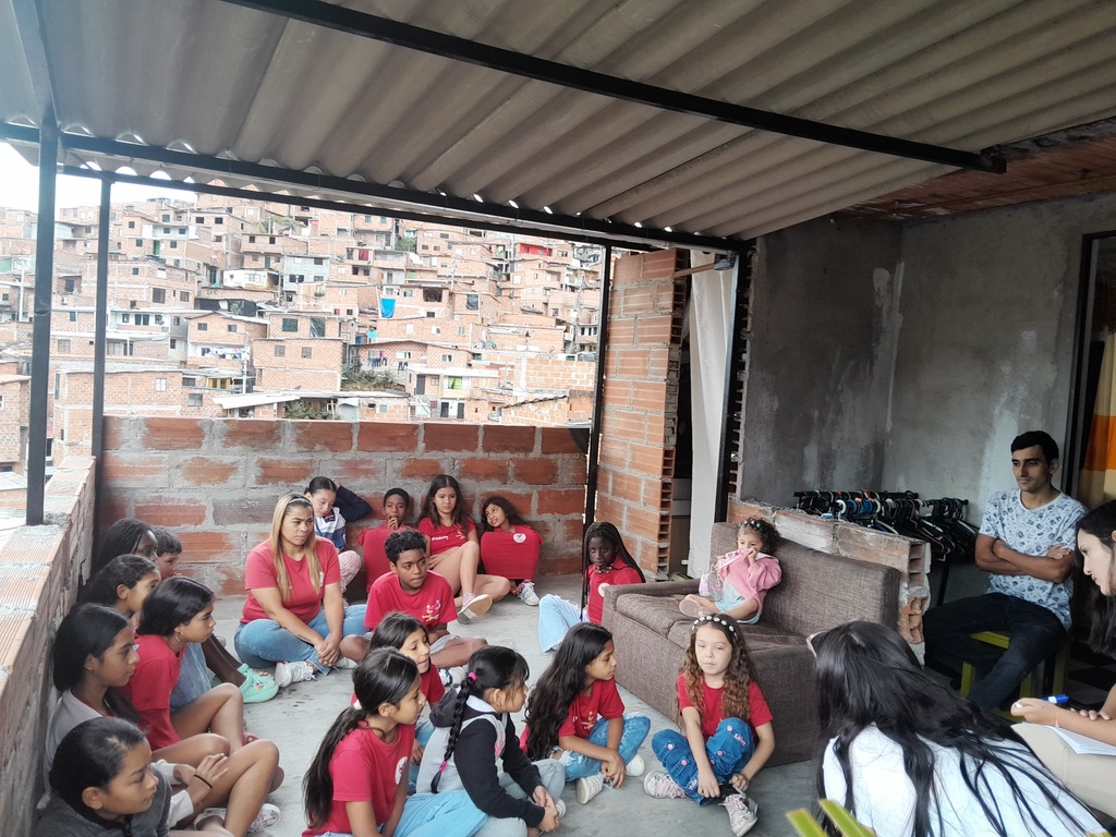 A group session on a rooftop in Medellín.