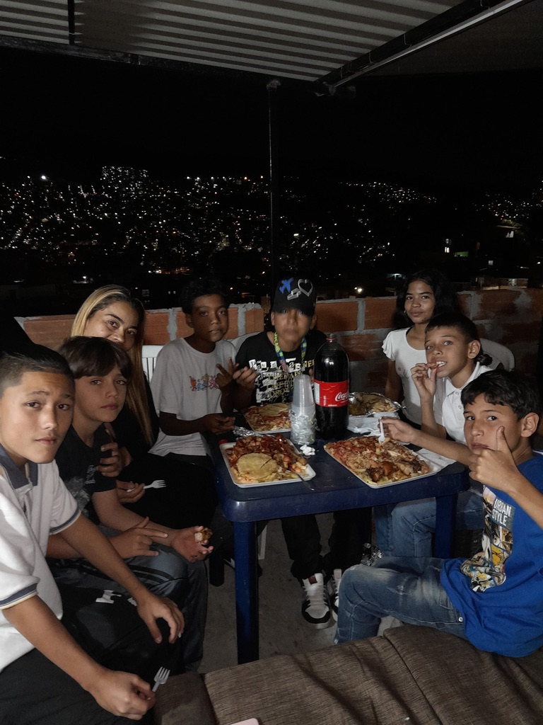 Sharing a meal under the city lights of Medellín.