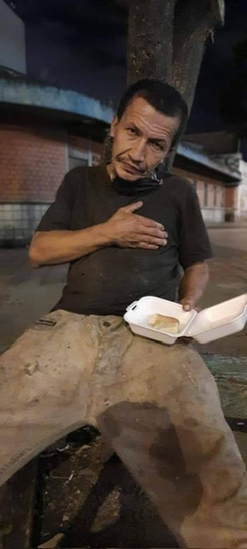 A neighbor thanks the volunteers.