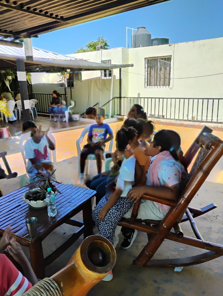 Families gather on the patio.