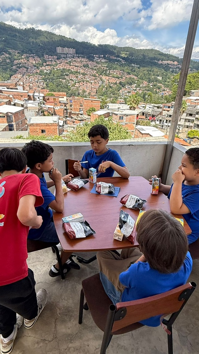 A snack on the rooftop above Medellín.