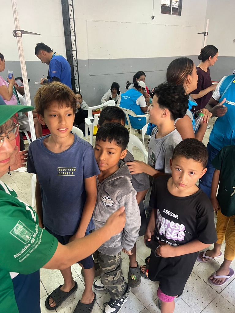 Children line up at the community center.